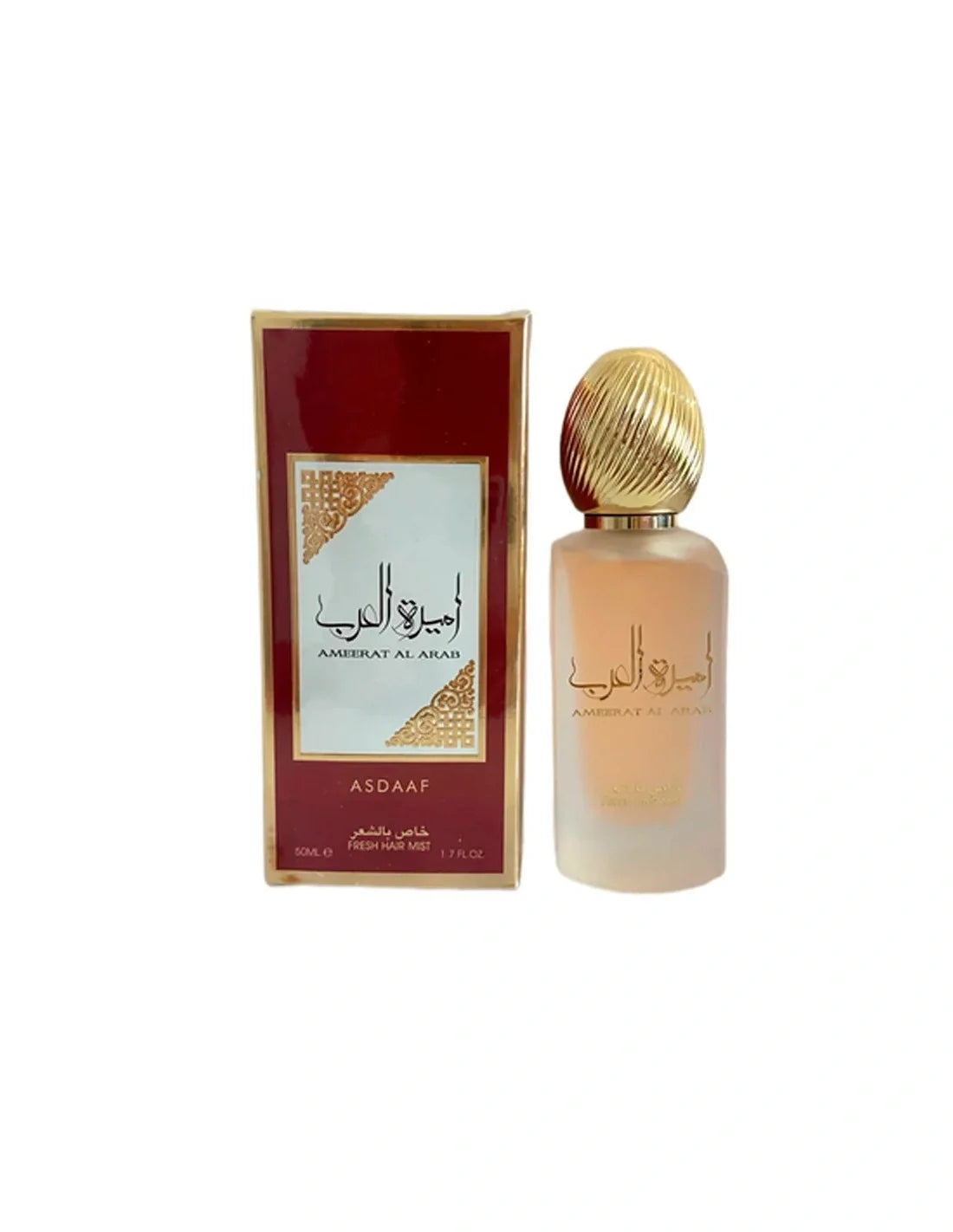 Frosted peach Ameerat Al Arab hair mist with golden egg-shaped cap