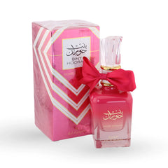 Bint Hooran Rose Passion perfume bottle in gradient pink with crystal cap and red bow