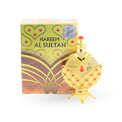 Hareem Al Sultan Gold perfume oil in ornate golden bottle with rubies