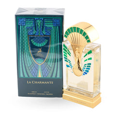Crystal perfume bottle with golden peacock design and colorful plumage