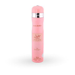 Pink air freshener with silver top on a white background