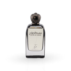 Perfume bottle with a metallic cap on a white background