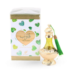 Afnan Quloob perfume oil bottle with heart-patterned packaging