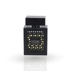 Rave Now perfume black bottle with geometric pattern and gold accents