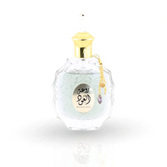 Rouat Al Oud perfume bottle by Lattafa with ornate crystal design and gold cap