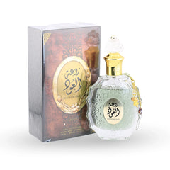 Rouat Al Oud perfume bottle by Lattafa with ornate crystal design and gold cap