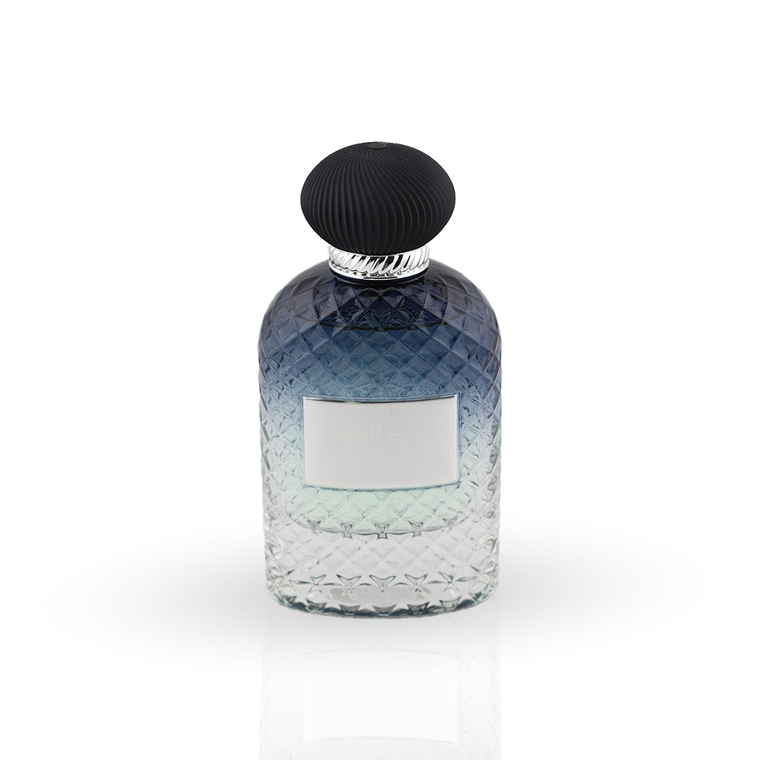 Perfume bottle with a black cap on a white background