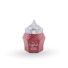 Red container with silver cap on a white background