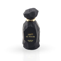 Black perfume bottle with gold cap and 'Al Noor' branding on a white background