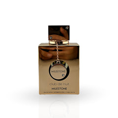 Gold perfume bottle with 'Milestone Club de Nuit' packaging on a white background