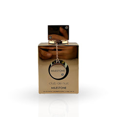Gold perfume bottle with 'Milestone Club de Nuit' packaging on a white background
