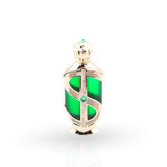 Decorative bottle with green glass and gold accents on a white background