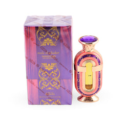 Perfume bottle and packaging with intricate design on a white background