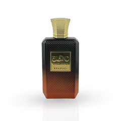 Perfume bottle with gold cap and label on a white background