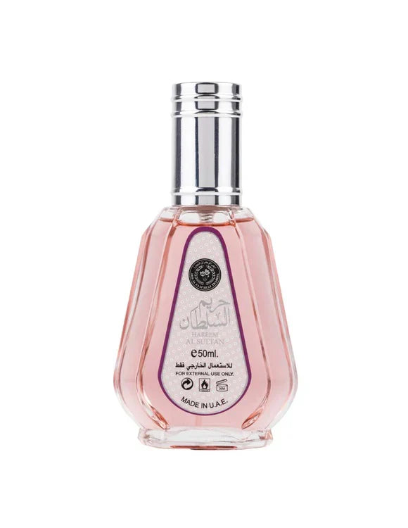 Hareem Al Sultan perfume in pink teardrop-shaped bottle with silver cap and Arabic labeling