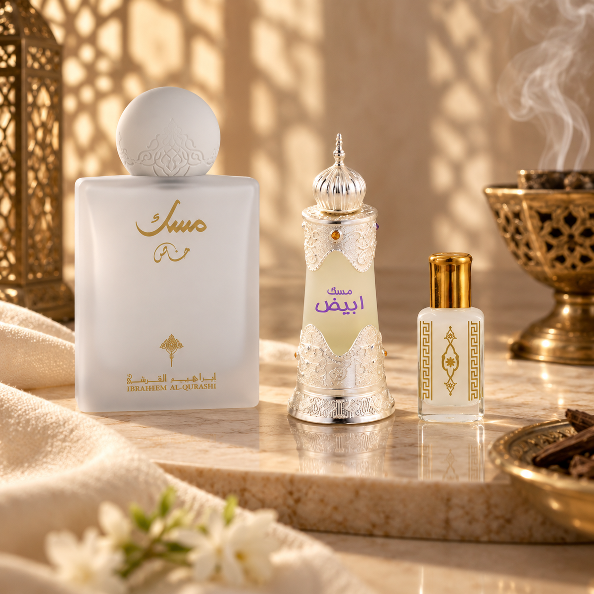 Musk perfume and perfume oils beside smoking incense in a cream Arabian arch setting