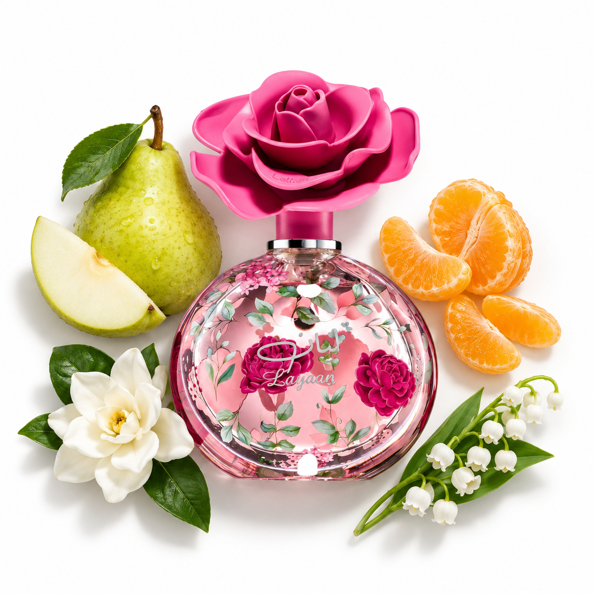 Lattafa Layaan 75ml bottle on white with green pear with one cut wedge, mandarin segments, small white gardenia flower, delicate lily-of-the-valley stem.