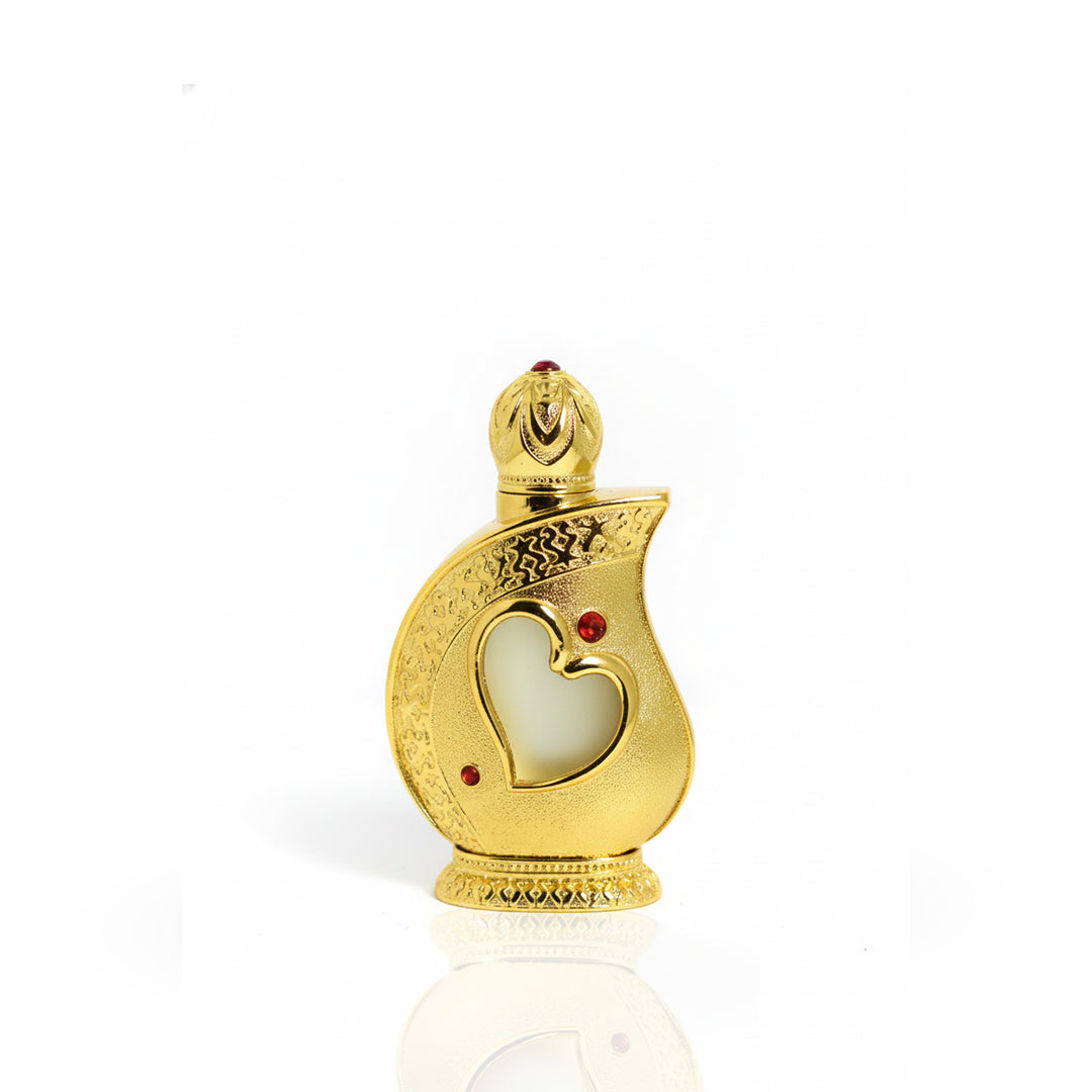 Gold perfume bottle with a heart design on a white background