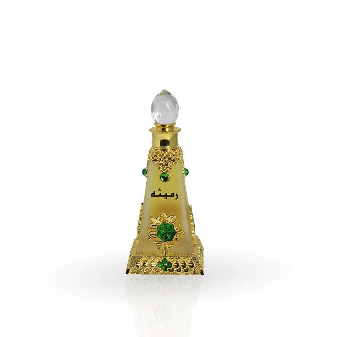 Decorative bottle with gold and green accents on a white background