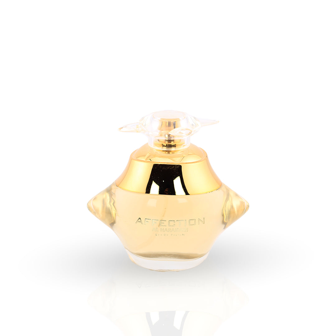 Al Haramain Affection Eau de Parfum 100ml — gold rounded bottle with wing, front view — mango plum white floral perfume