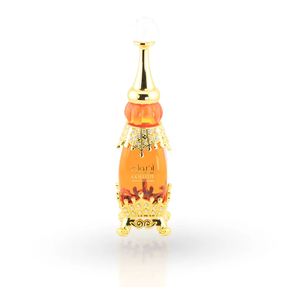 Afnan Adwaa Al Sharq Concentrated Perfume Oil 25ml — ornate gold footed amber glass, front view — amberwood musk saffron oil