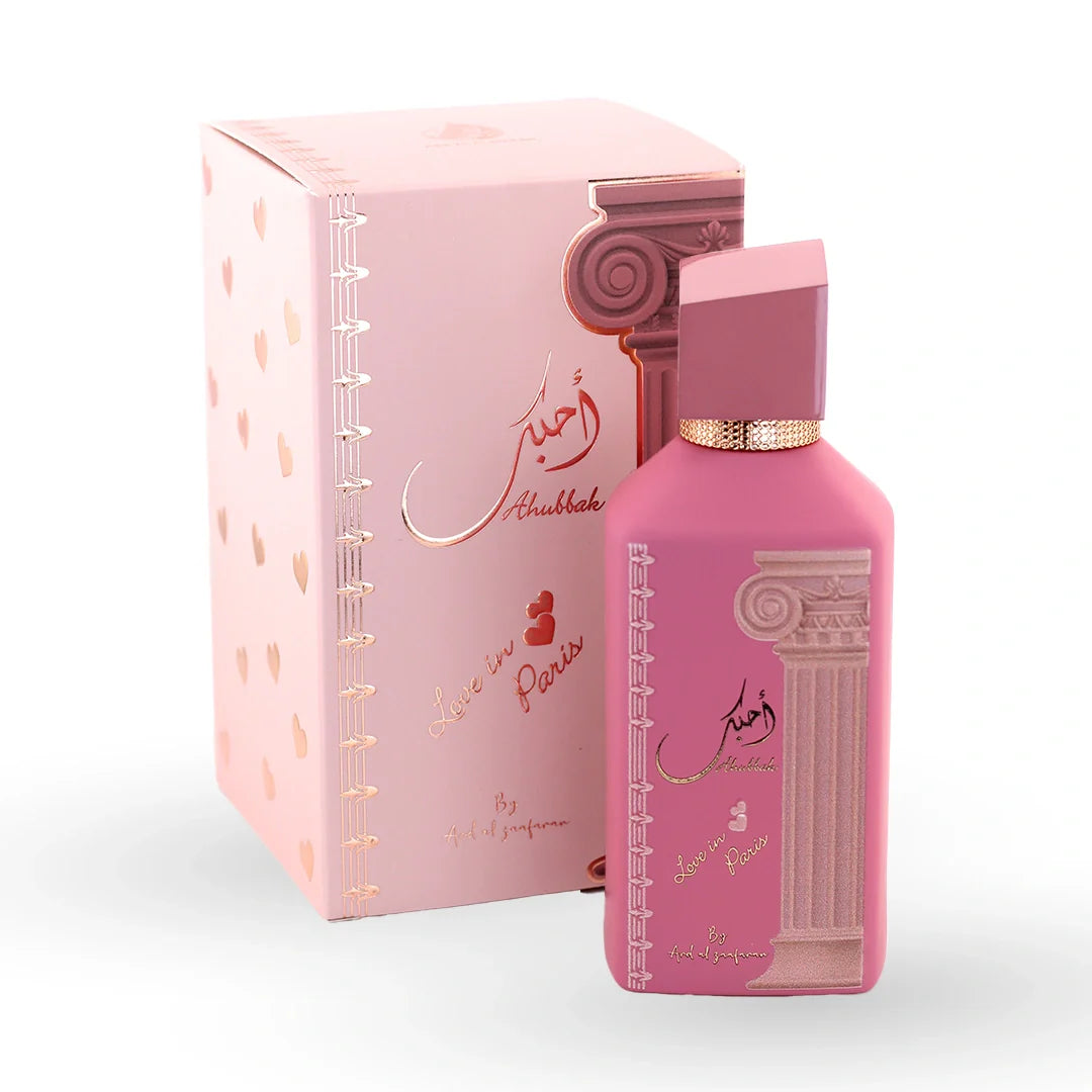 Ard Al Zaafaran Ahebbak Eau de Parfum 100ml — pink fluted bottle beside its gold-patterned pink presentation box