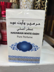 Al Haramain White Oudh Pure Perfume with elegant blue ornamental design