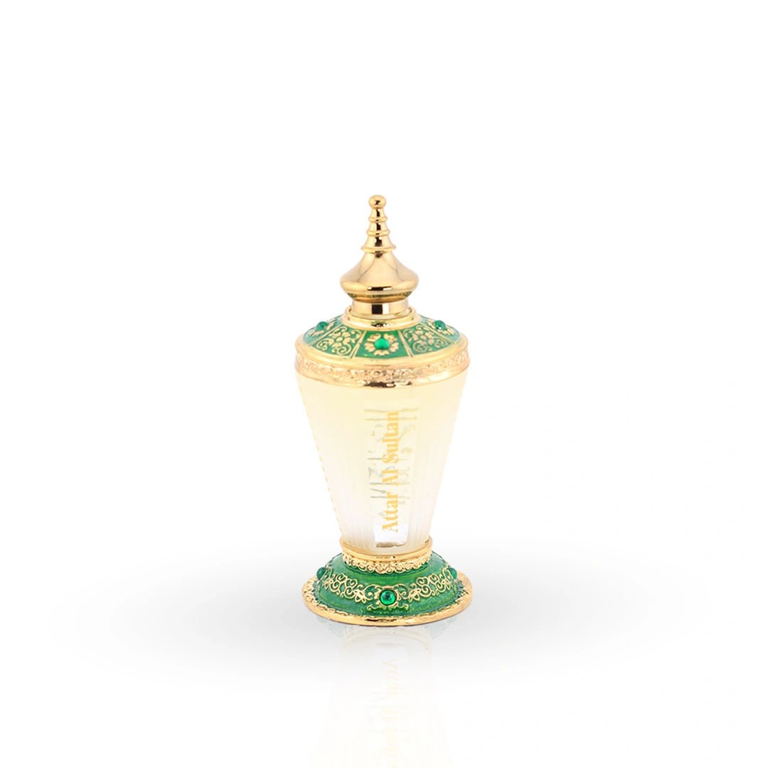 Attar Al Sultan ornate perfume oil bottle with emerald and gold design