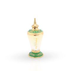 Attar Al Sultan ornate perfume oil bottle with emerald and gold design