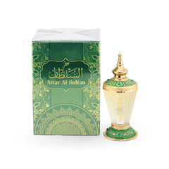 Attar Al Sultan ornate perfume oil bottle with emerald and gold design