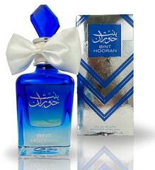 Bint Hooran blue gradient perfume bottle with white bow by Lattafa