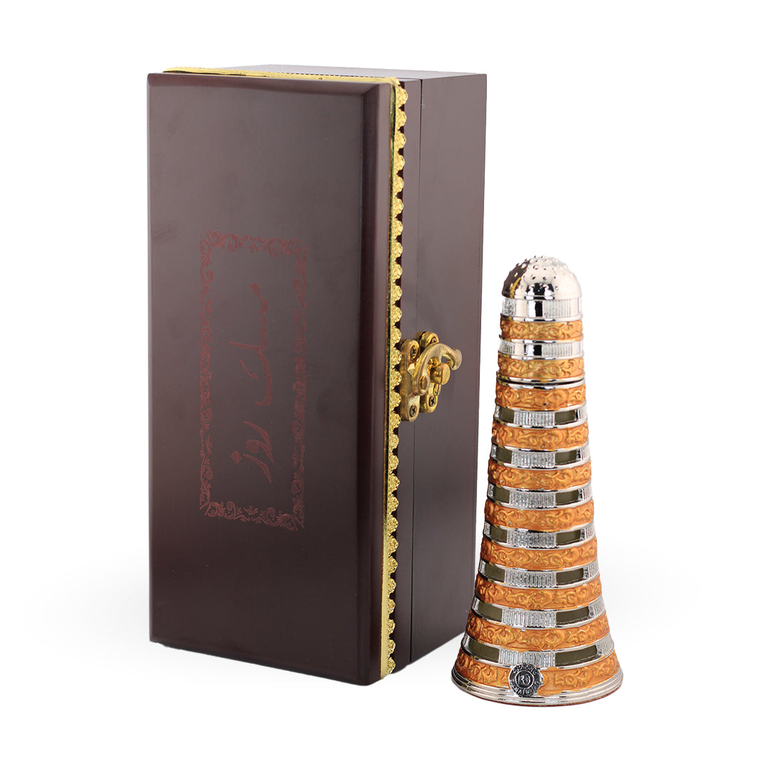 Decorative bottle with a brown box on a white background