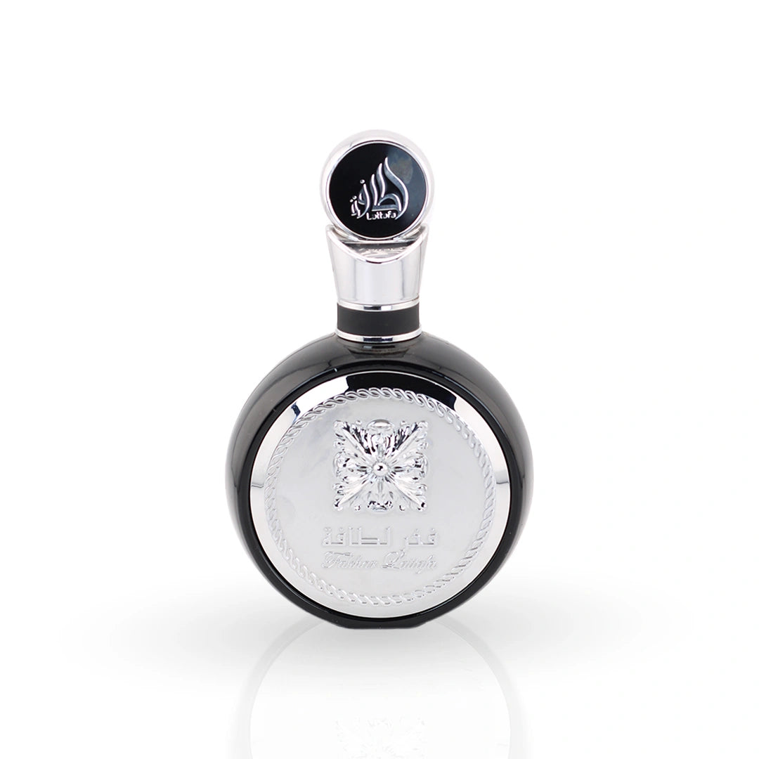 Fakhar Lattafa Black perfume bottle with ornate silver packaging