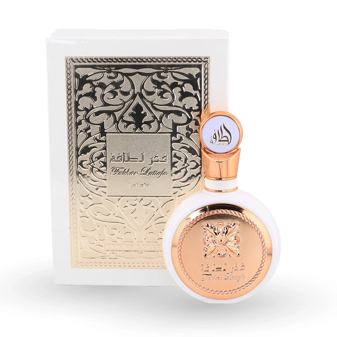 Fakhar Lattafa White perfume bottle with ornate rose gold packaging