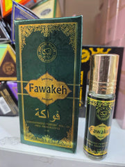 Fawakeh roll-on perfume bottle with green and gold Arabic packaging by Atika Perfumes
