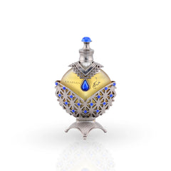 Hareem Al Sultan Blue perfume oil in silver bottle with sapphire gems
