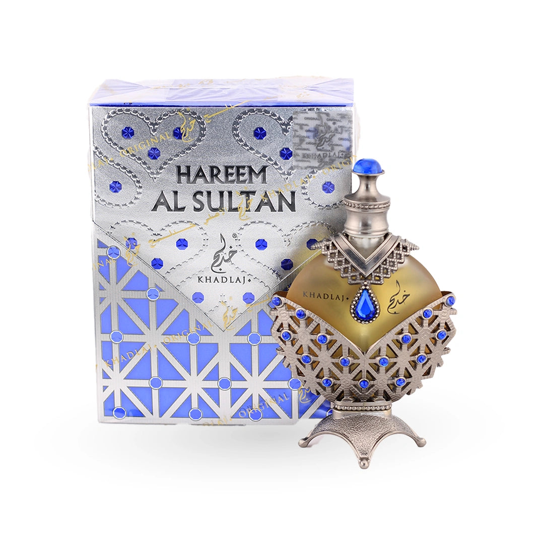 Hareem Al Sultan Blue perfume oil in silver bottle with sapphire gems