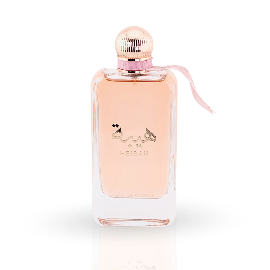 Heibah rose gold perfume bottle with pink ribbon and fluted cap detail