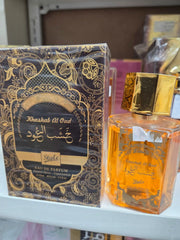 Khashab Al Oud Style 100ml golden perfume bottle with ornate packaging