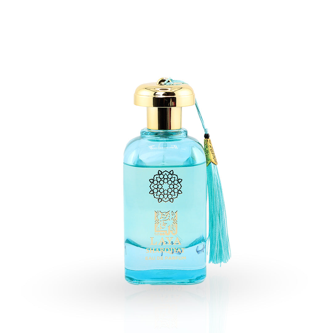 Blue perfume bottle with gold cap and tassel on a white background