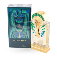 Crystal perfume bottle with golden peacock design and colorful plumage