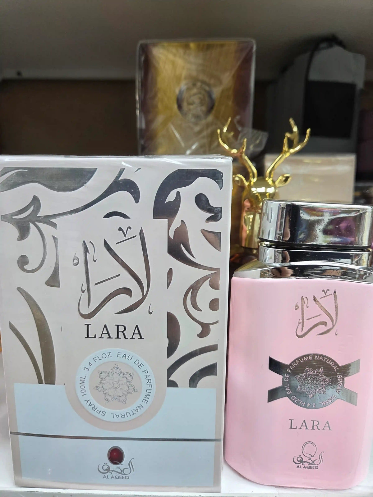 Lara 100ml eau de parfum pink bottle by Al Aqeeq with packaging
