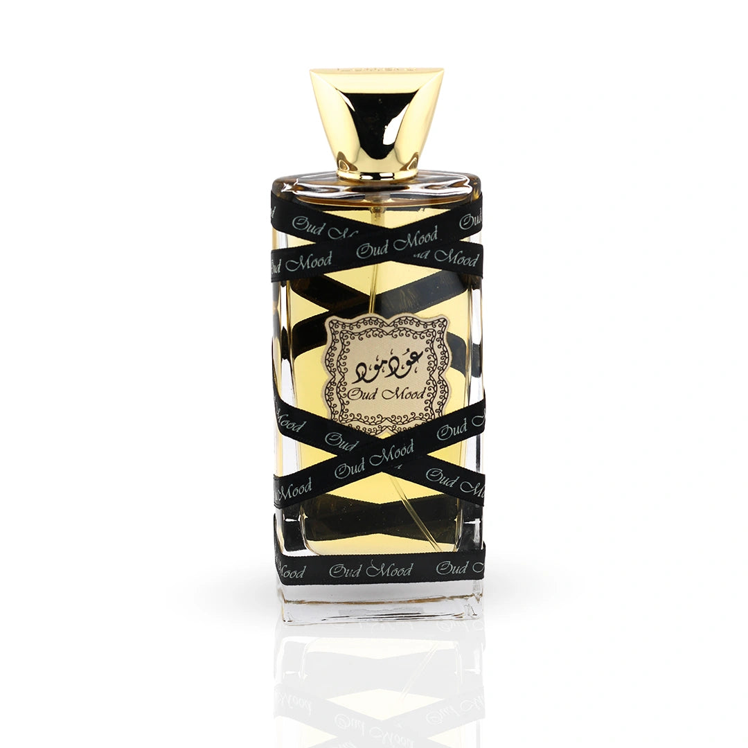 Lattafa Oud Mood perfume bottle with luxury golden gift packaging