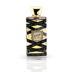 Lattafa Oud Mood perfume bottle with luxury golden gift packaging