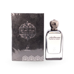 Perfume bottle with decorative box on a white background