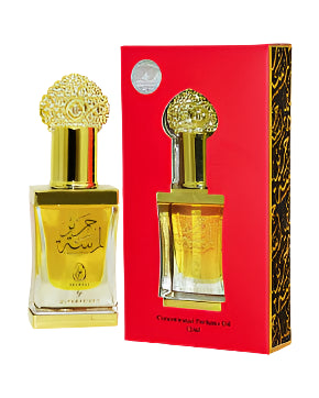 Lamsat Harir 12ml concentrated oil by Arabiyat with golden bottle and red packaging