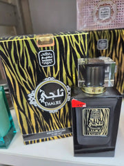 Nabeem Thaljee aqua perfume 100ml black bottle with tiger stripe packaging