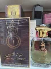 Oudh Al Thameen 100ml oud perfume with golden cap and ornate packaging