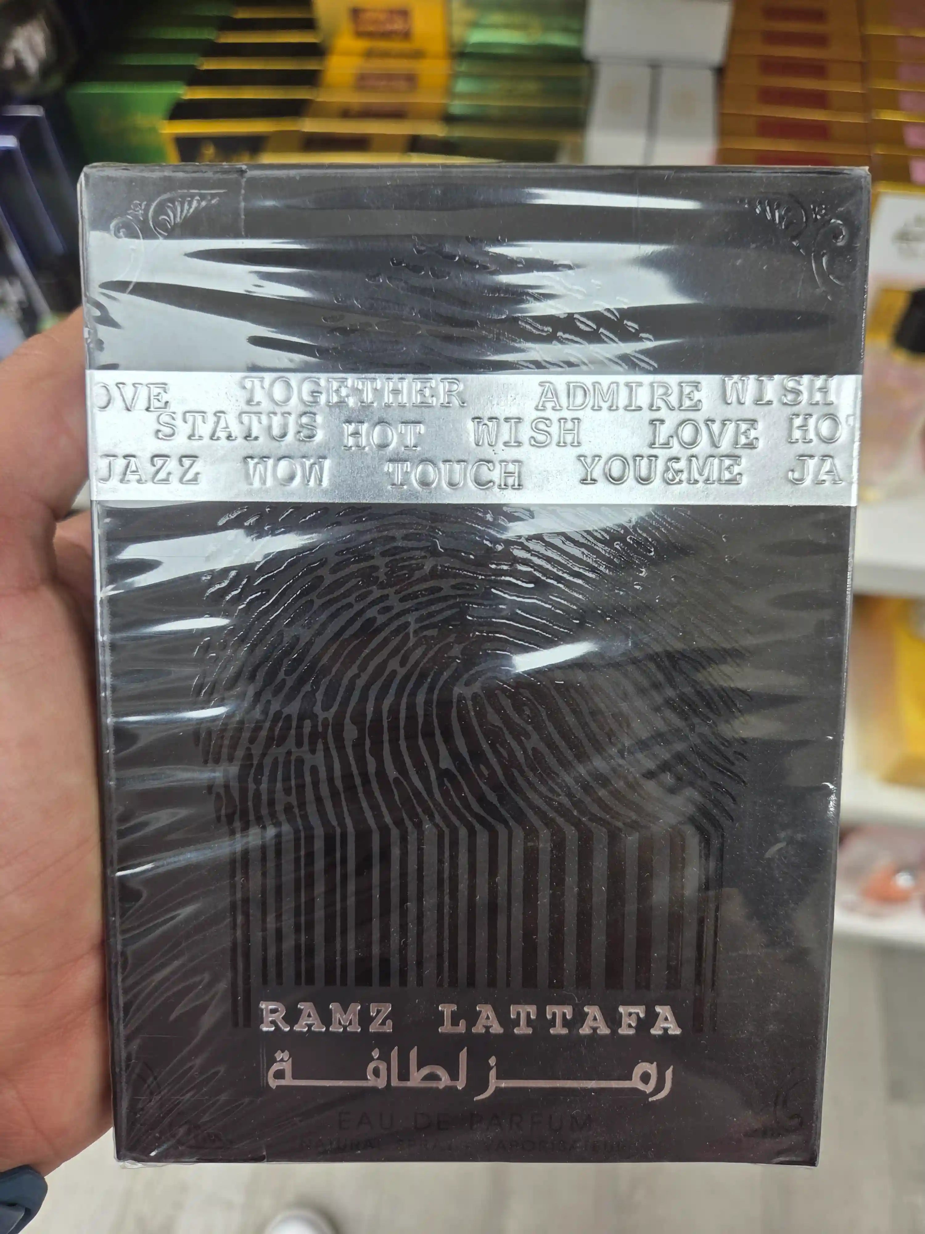 Ramz Lattafa perfume box textured black silver design
