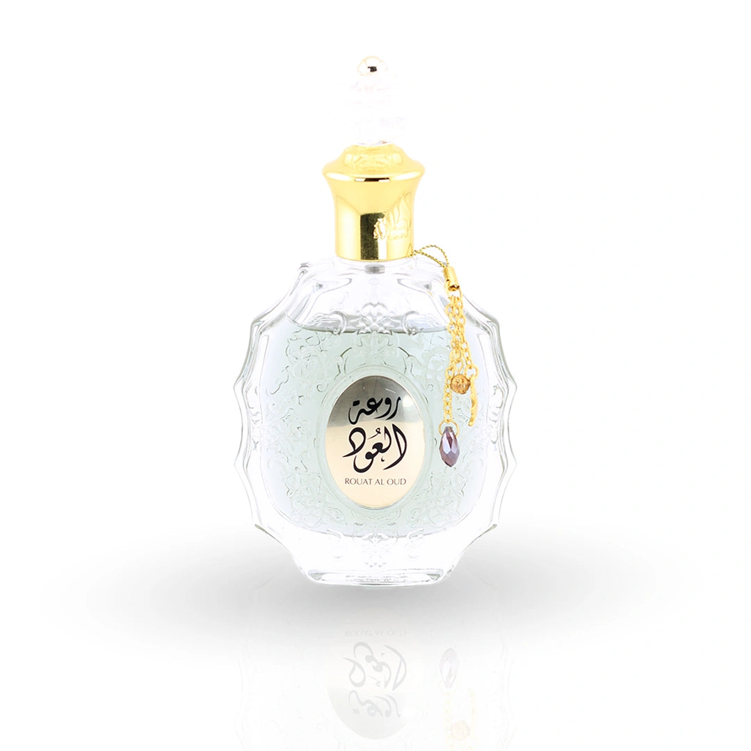 Rouat Al Oud perfume bottle by Lattafa with ornate crystal design and gold cap
